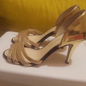 Open toe gold and black heels
